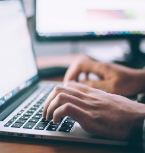 Web developer with laptop