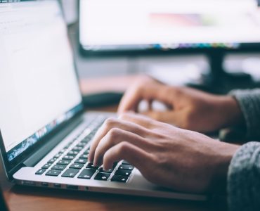 Web developer with laptop