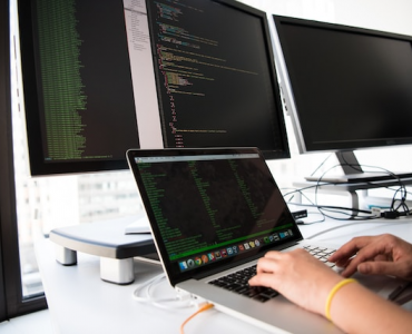 Software Engineer Coding On Laptop