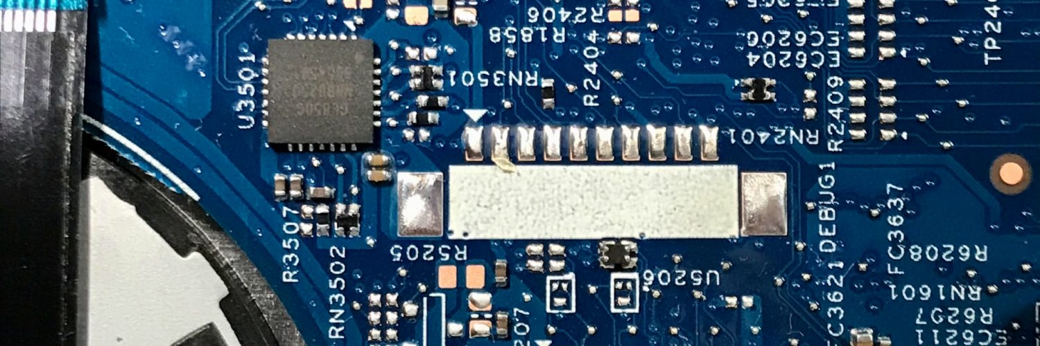 Laptop computer circuitry on blue motherboard