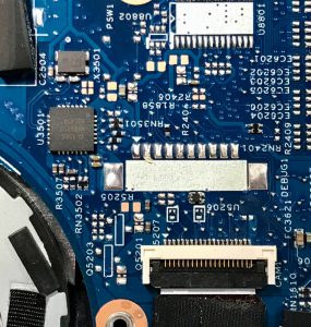 Laptop computer circuitry on blue motherboard