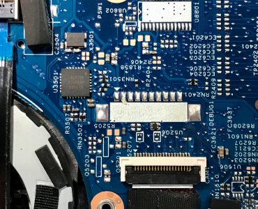 Laptop computer circuitry on blue motherboard
