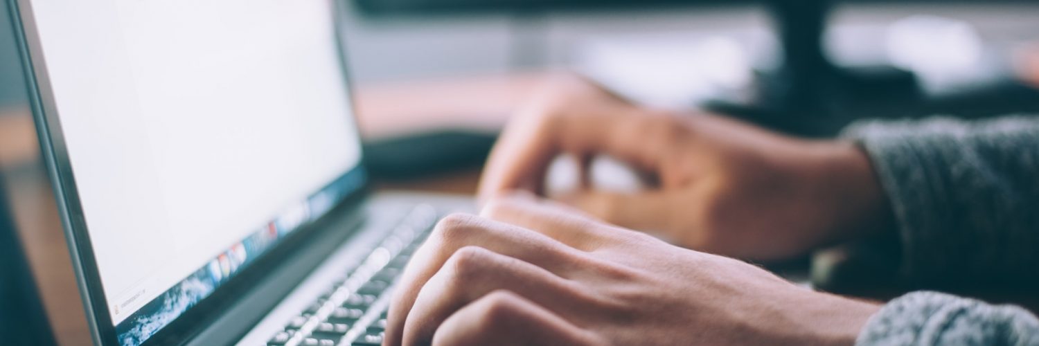 Web developer with laptop