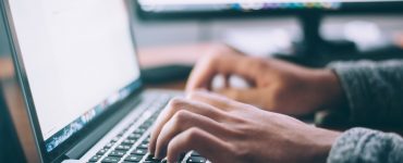 Web developer with laptop